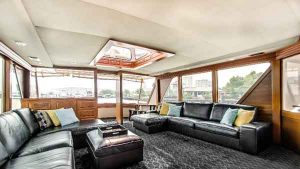 Lower deck of the Sophisticated Lady yacht has leather couches